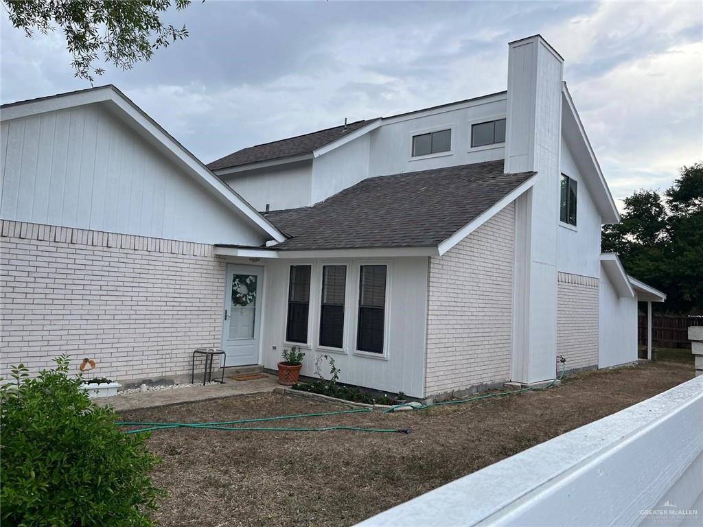 1216 Quail Avenue McAllen, TX 78504 - Photo 26 of 28 a front view of a house with garden