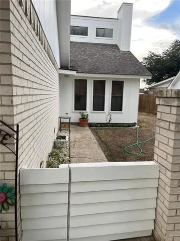 a front view of a house with garage