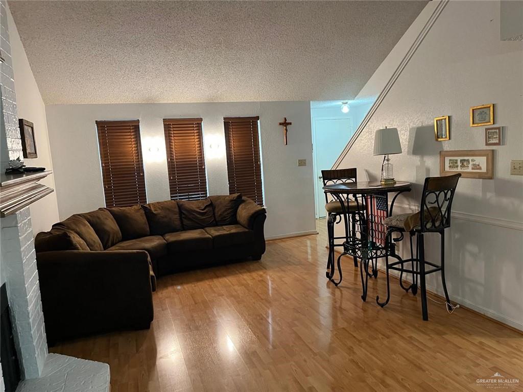 1216 Quail Avenue McAllen, TX 78504 - Photo 5 of 28 a living room with furniture and wooden floor