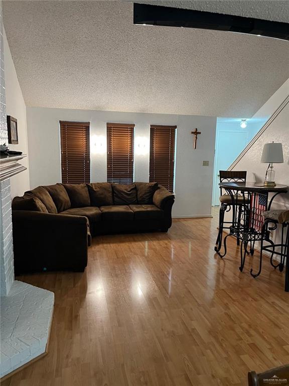 1216 Quail Avenue McAllen, TX 78504 - Photo 6 of 28 a living room with furniture and wooden floor