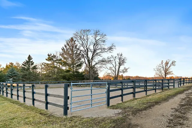 a view of outdoor space with iron fence