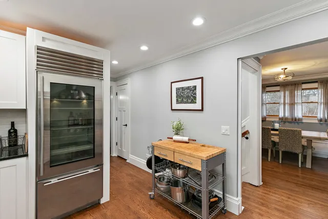 a bathroom with a sink a mirror and a toilet