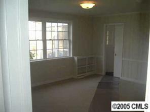 4501 Barwick Road Charlotte, NC 28211 - Photo 6 of 8 a view of an empty room and a window