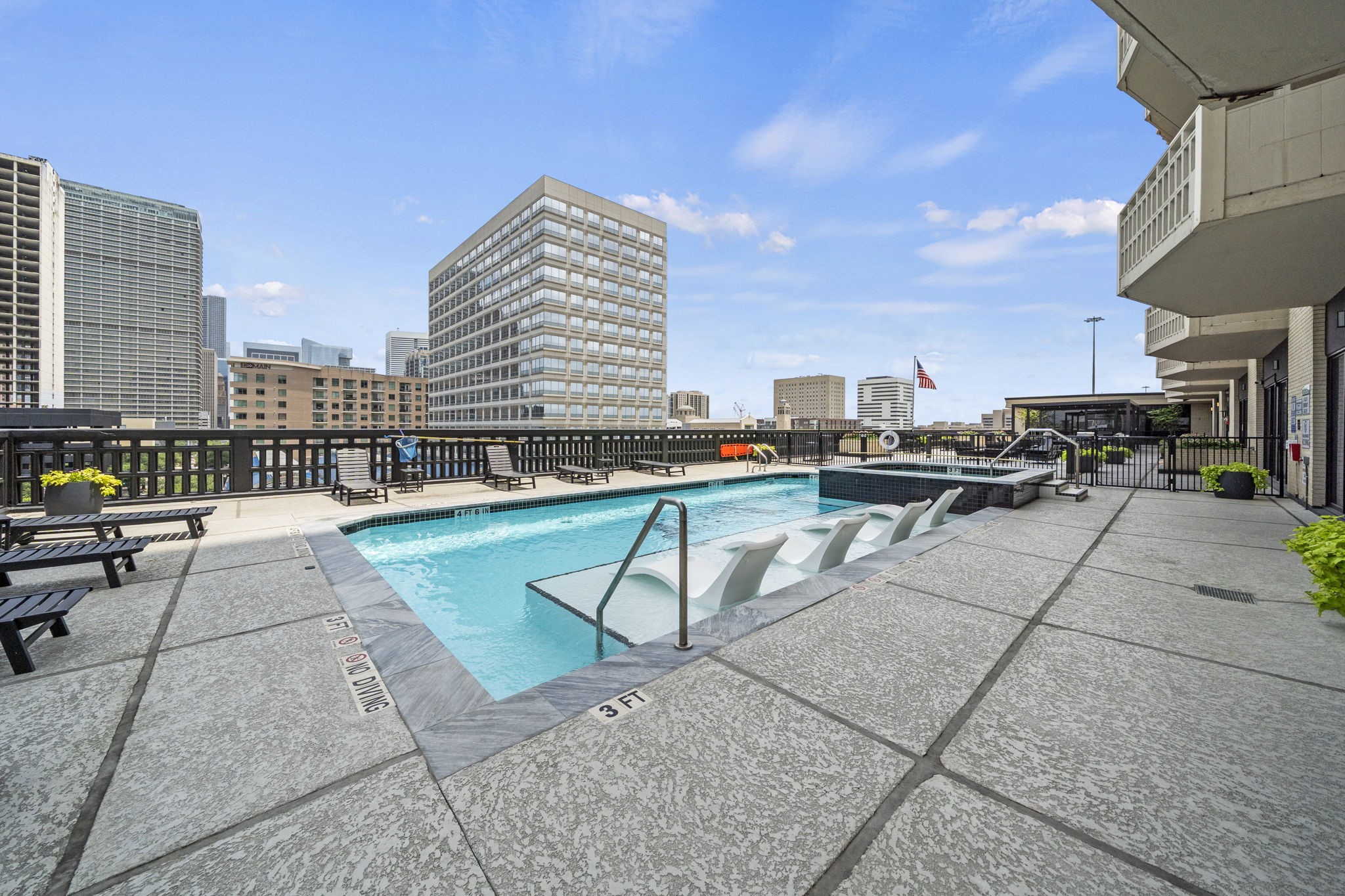 2016 Main Street, Unit 2302 Houston, TX 77002 - Photo 27 of 34 Resort-style pool overlooking the city skyline offers the perfect setting to relax, unwind, and enjoy stunning views.