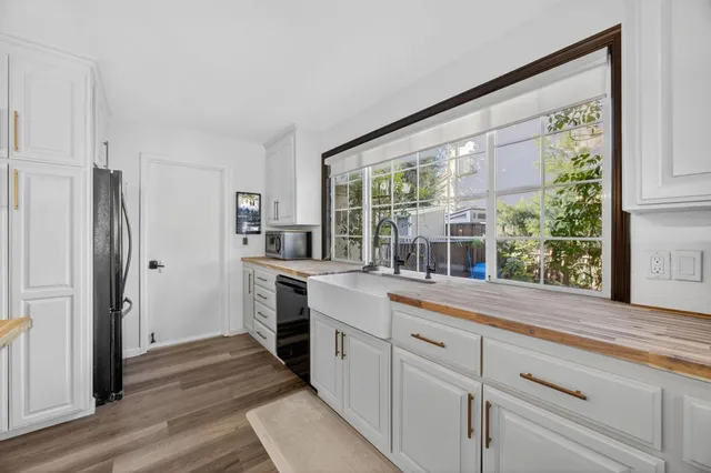 an aerial view of a house with swimming pool