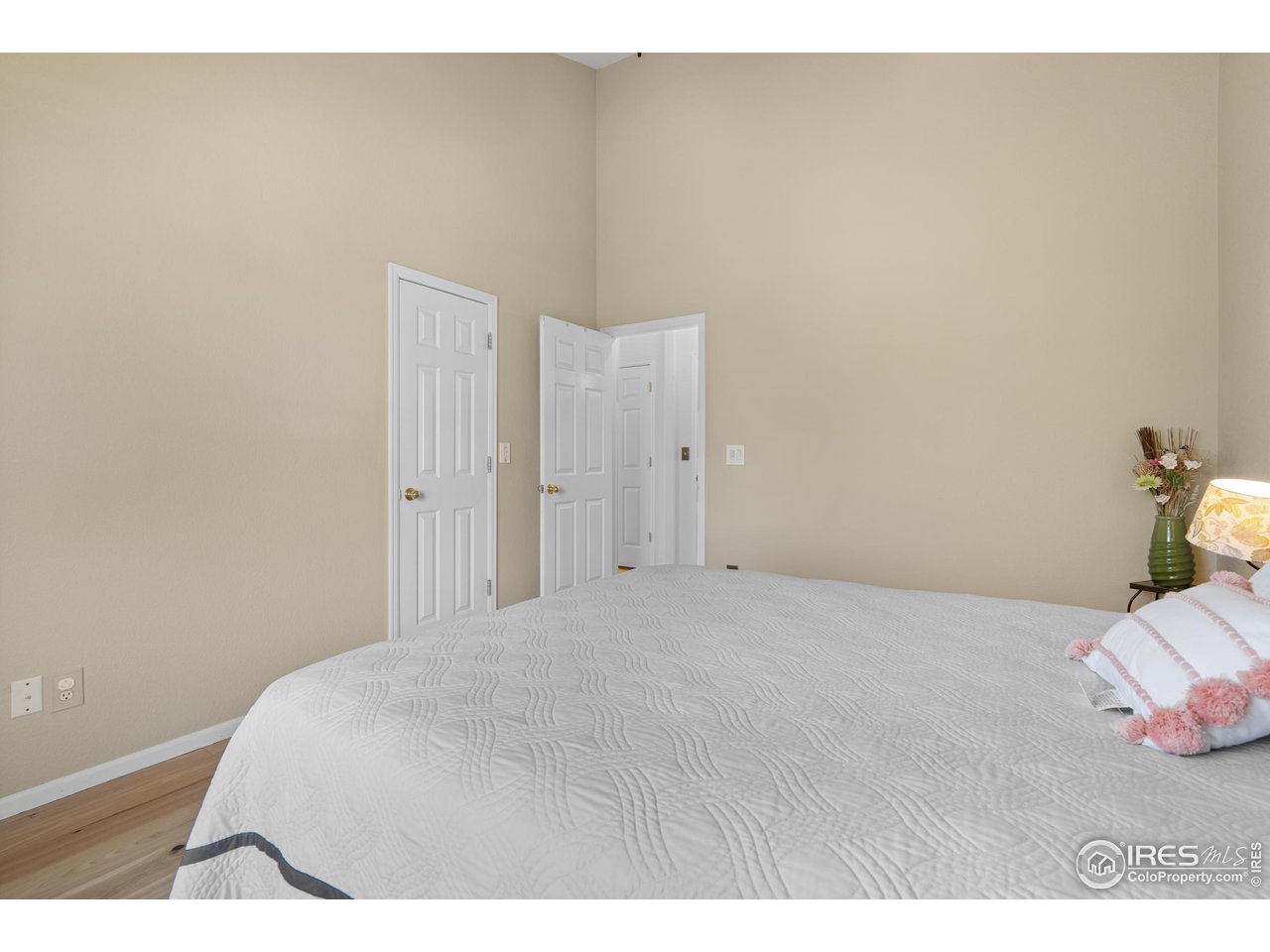 10351 Cook Way Thornton, CO 80229 - Photo 19 of 30 a bedroom with a bed