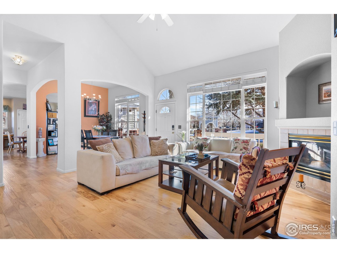 10351 Cook Way Thornton, CO 80229 - Photo 7 of 30 a living room with furniture and a wooden floor