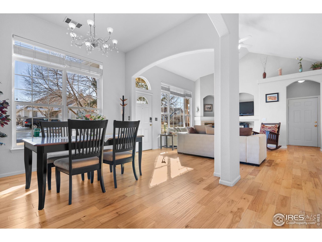 10351 Cook Way Thornton, CO 80229 - Photo 8 of 30 a dining room with furniture and wooden floor