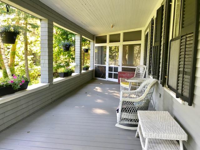 940 Point Road Hancock, ME 04640 - Photo 3 of 43 Wrap-around sun porch.