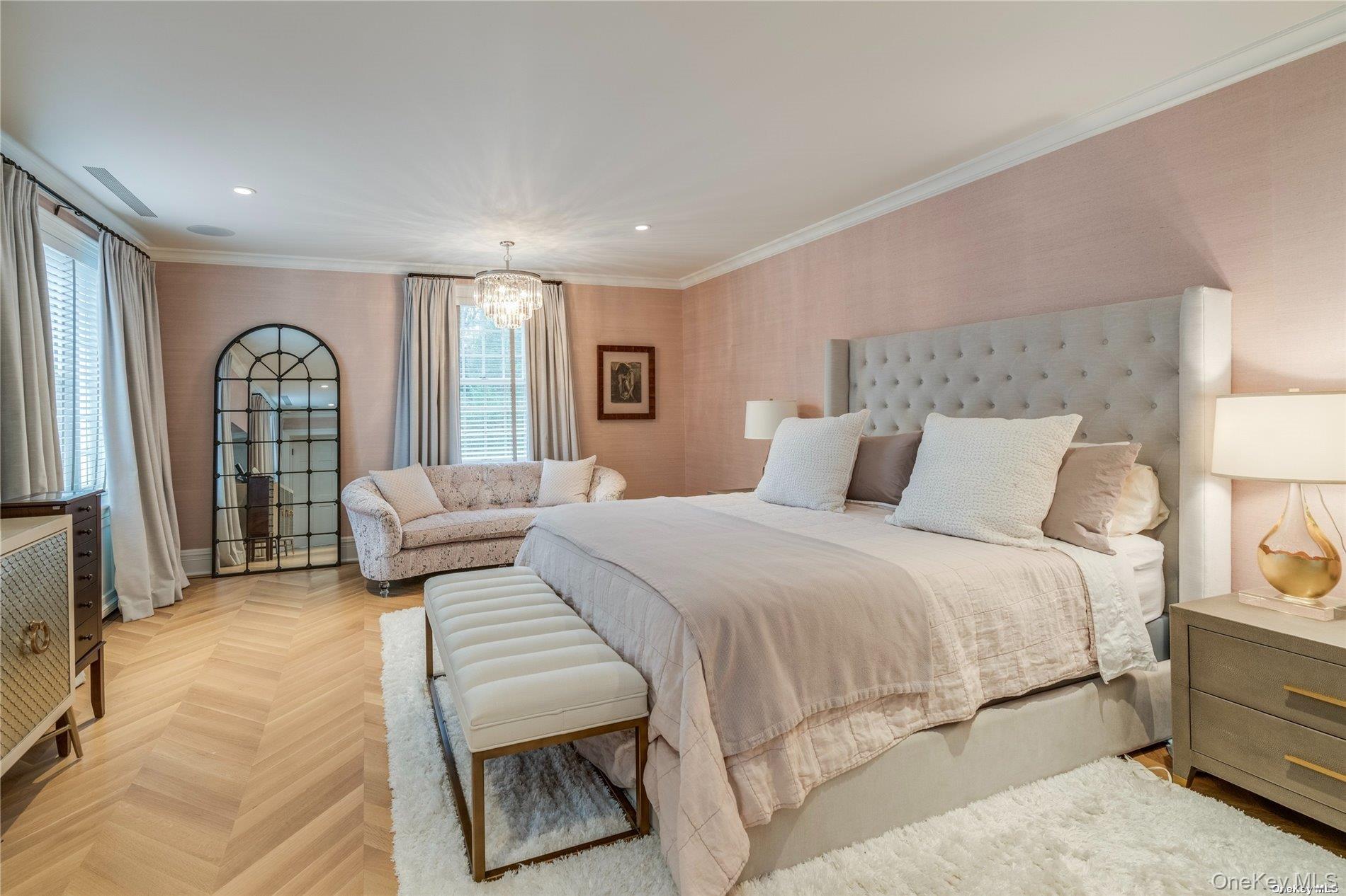 40 Piping Rock Road Locust Valley, NY 11560 - Photo 14 of 33 a bedroom with a large bed and a couch