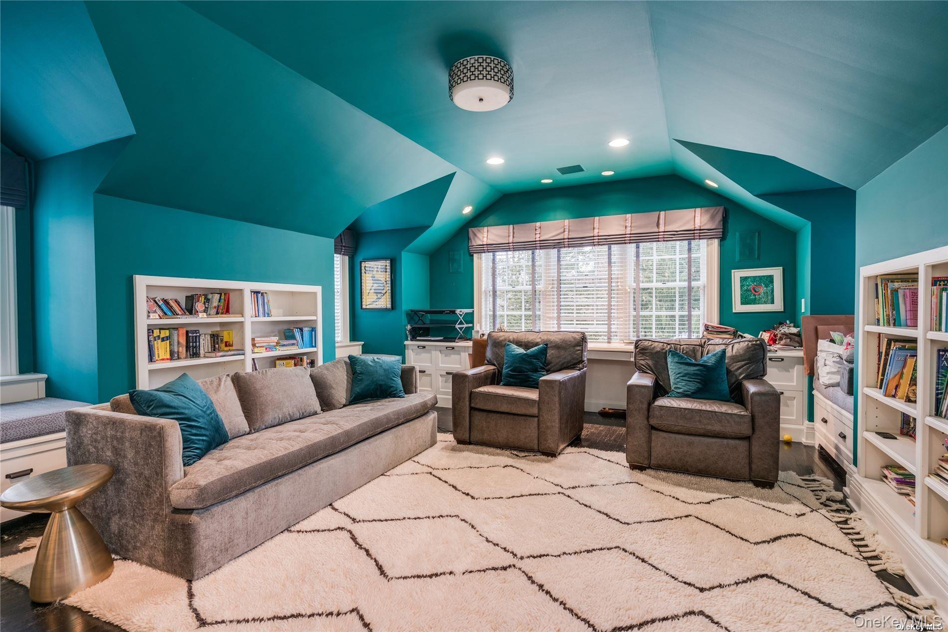 40 Piping Rock Road Locust Valley, NY 11560 - Photo 21 of 33 a living room with furniture and a large window