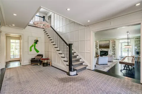 a view of entryway livingroom and hall