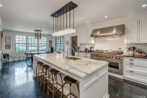 a kitchen with sink and stove