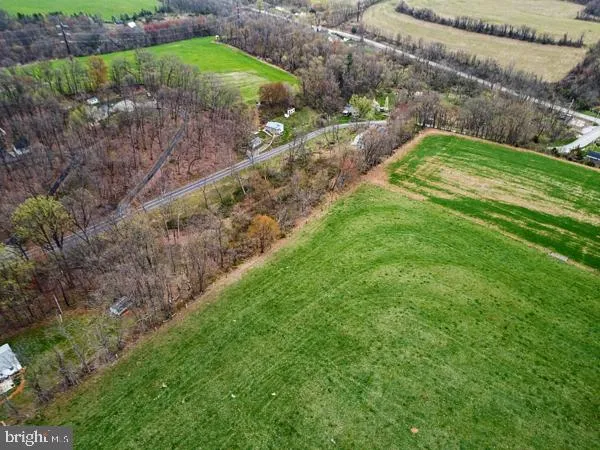 a view of a yard with an outdoor space