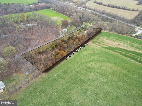1155 Gebhart Road, Unit LOT B Windsor, PA 17366 - Photo 23 of 25 a view of a backyard with a plants and large trees