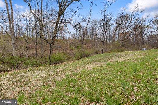 1155 Gebhart Road, Unit LOT B Windsor, PA 17366 - Photo 9 of 25 a backyard of a house with lots of green space