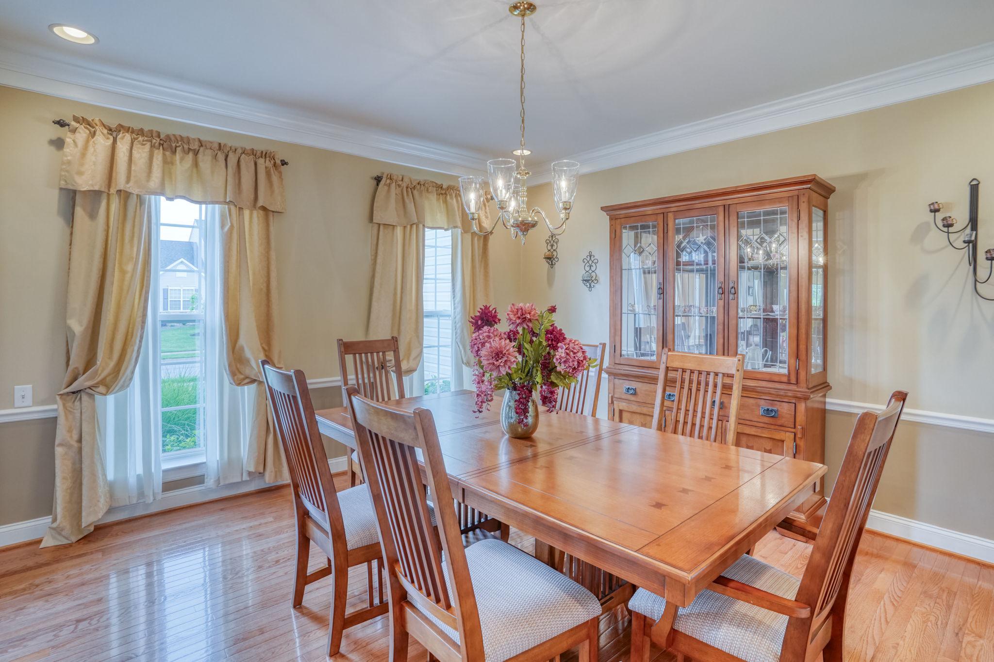 213 Loft Street Townsend, DE 19734 - Photo 23 of 76 a dining room with furniture window wooden floor