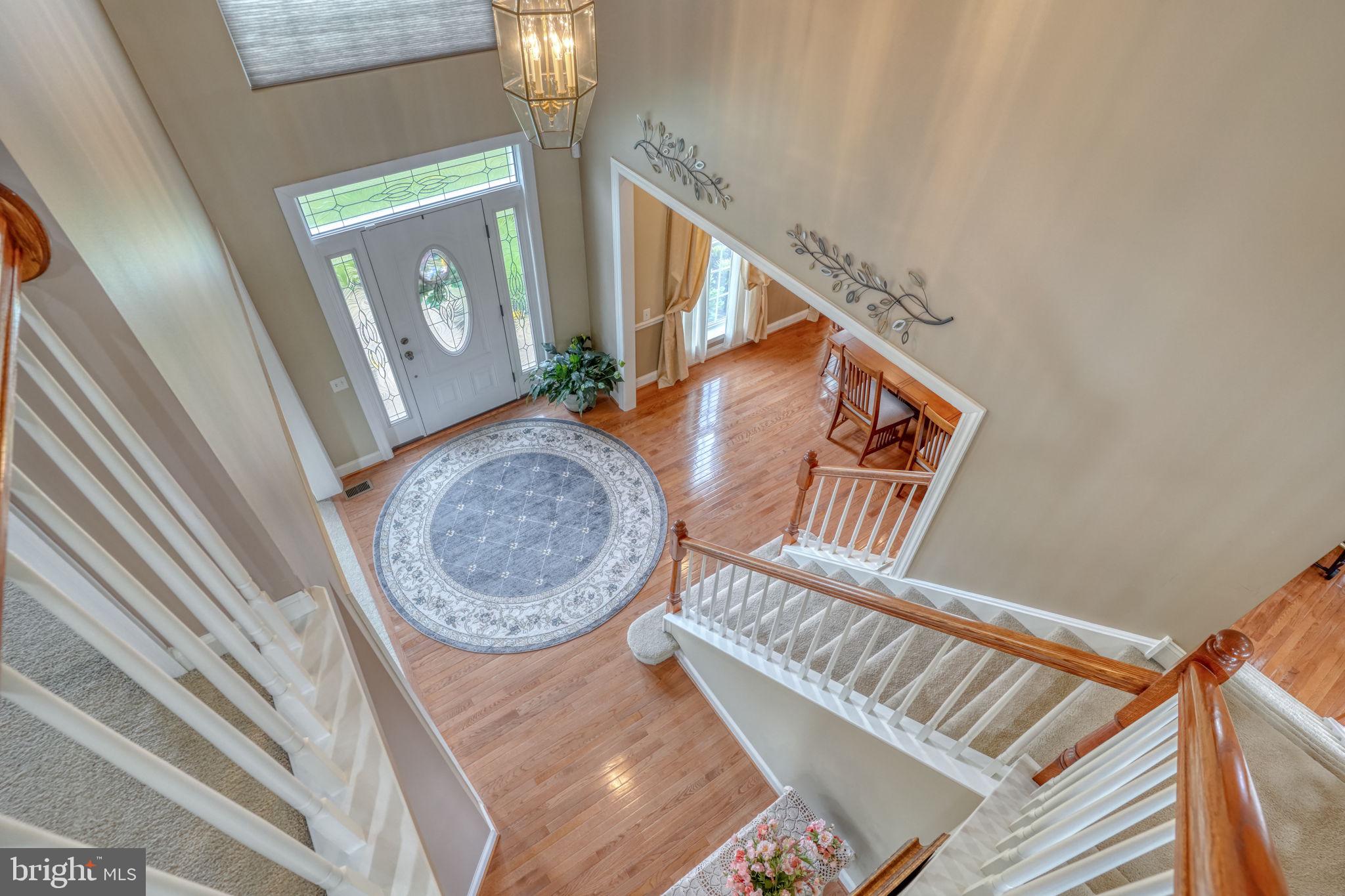 213 Loft Street Townsend, DE 19734 - Photo 46 of 76 Inviting foyer with elegant staircase.