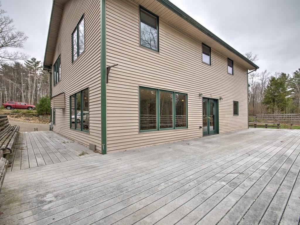 16 Oak Ledge Road Pittston, ME 04345 - Photo 13 of 29 This is the wrap around deck with...