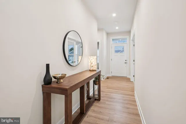 a view of a hallway with front door
