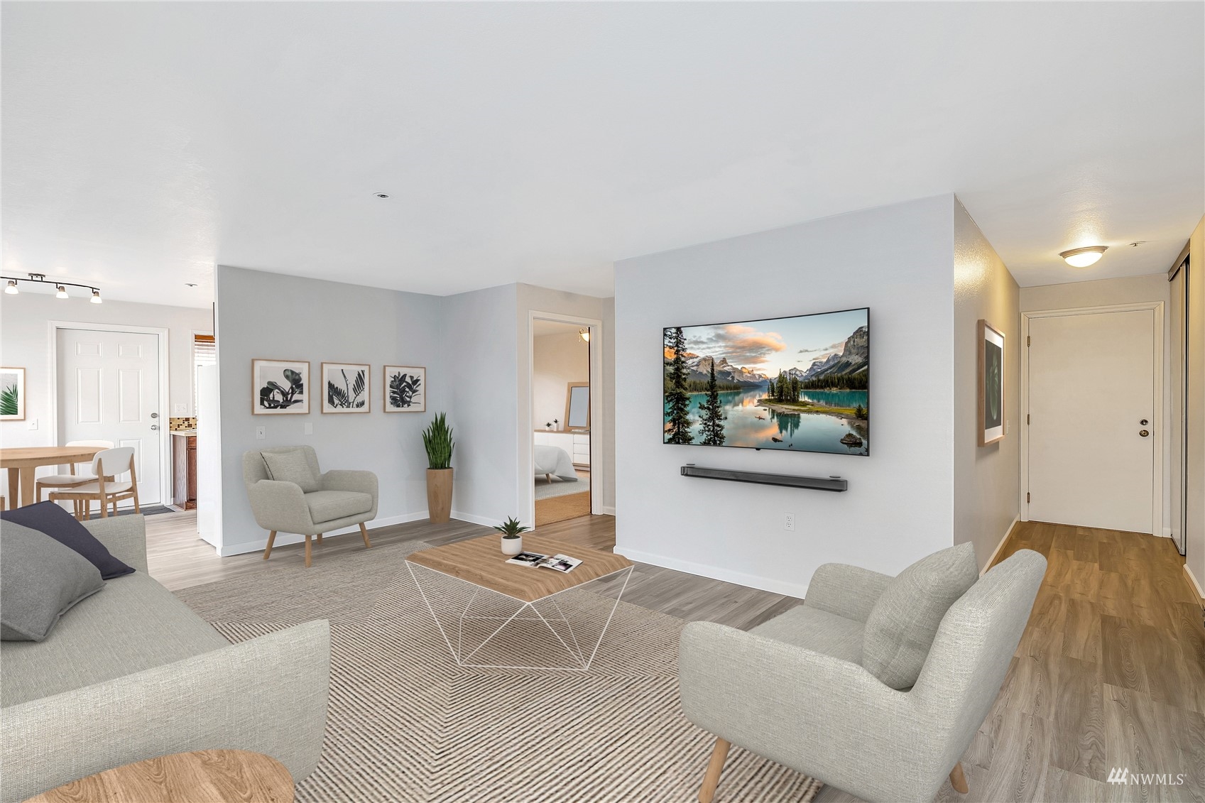 2619 Rucker Avenue, Unit 1 Everett, WA 98201 - Photo 1 of 19 a living room with furniture and a flat screen tv