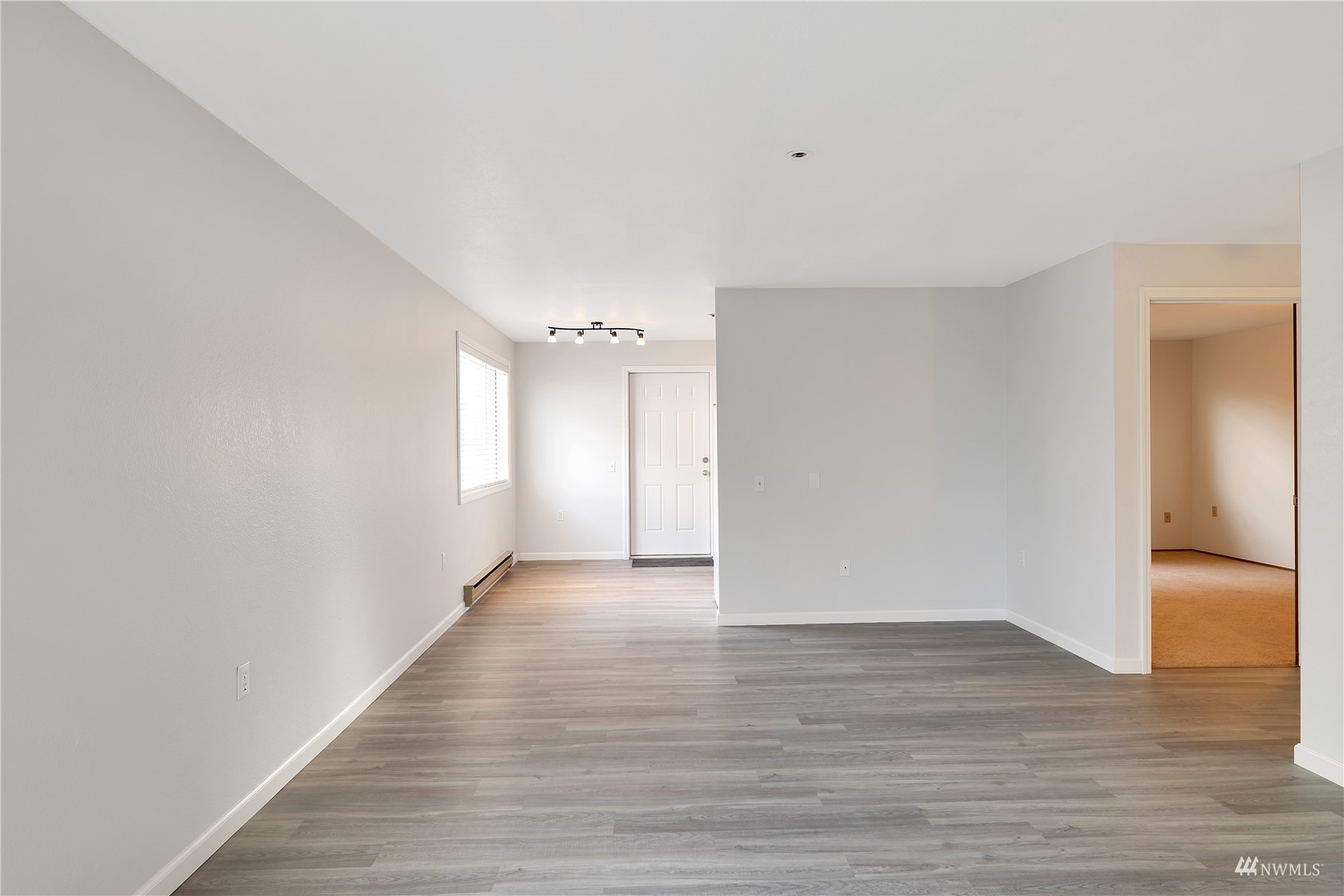 2619 Rucker Avenue, Unit 1 Everett, WA 98201 - Photo 13 of 19 a view of an empty room and wooden floor
