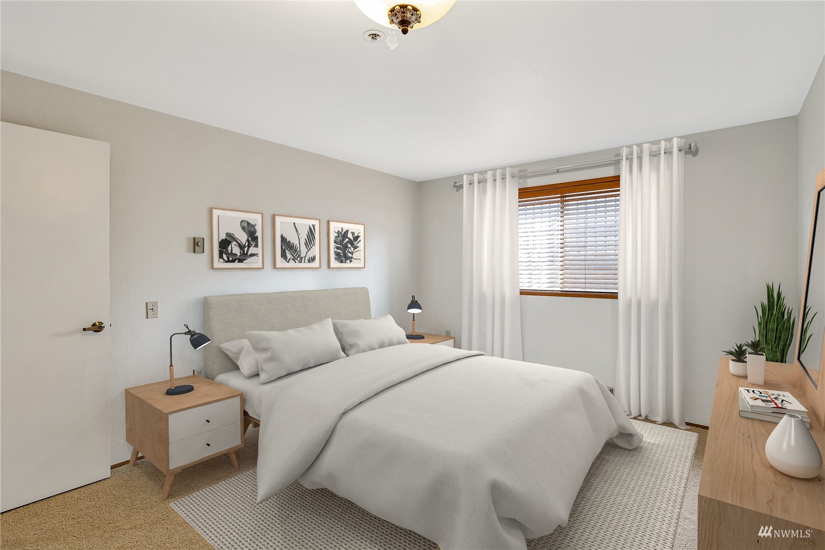 2619 Rucker Avenue, Unit 1 Everett, WA 98201 - Photo 7 of 19 a bedroom with a bed and a window