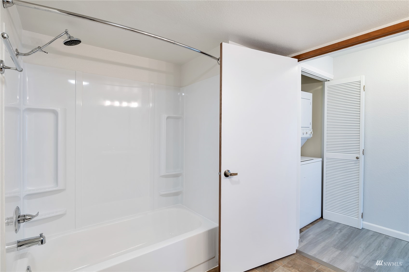 2619 Rucker Avenue, Unit 1 Everett, WA 98201 - Photo 10 of 19 a bathroom with a bathtub and a shower