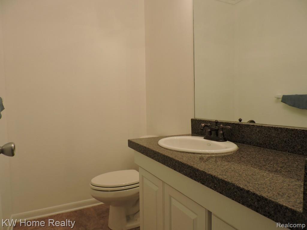 7163 Stonebrook Road West Bloomfield, MI 48322 - Photo 26 of 46 Updated Powder Room.jpg