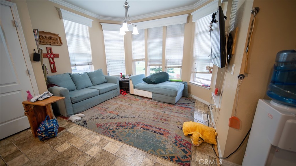 5 Ash Via Anaheim, CA 92801 - Photo 2 of 17 a living room with furniture and a large window