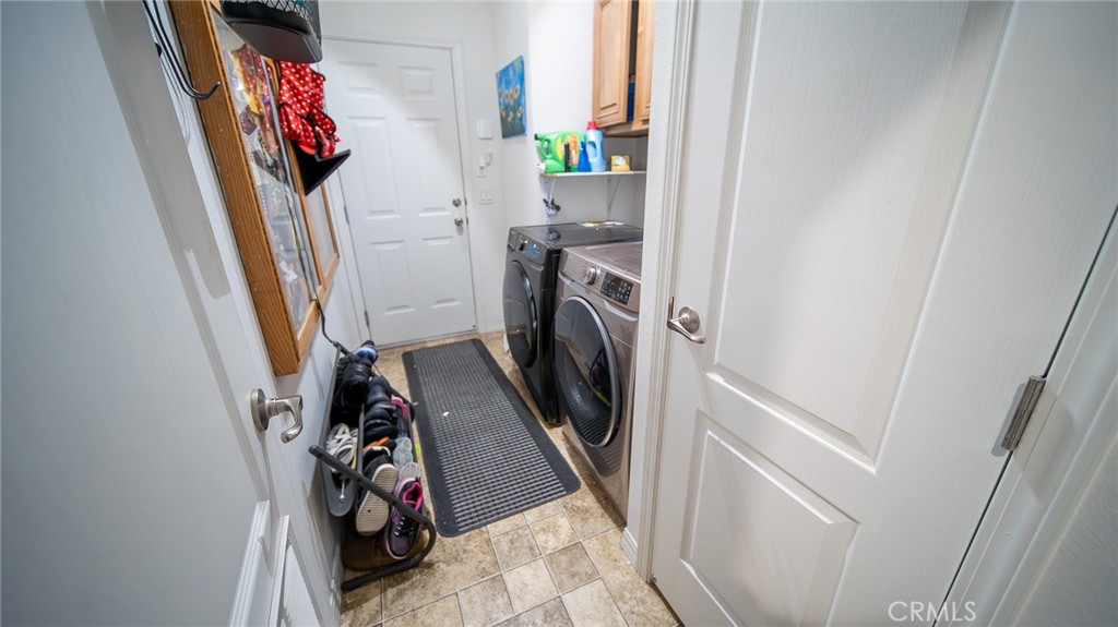 5 Ash Via Anaheim, CA 92801 - Photo 8 of 17 a view of a closet with storage and utility