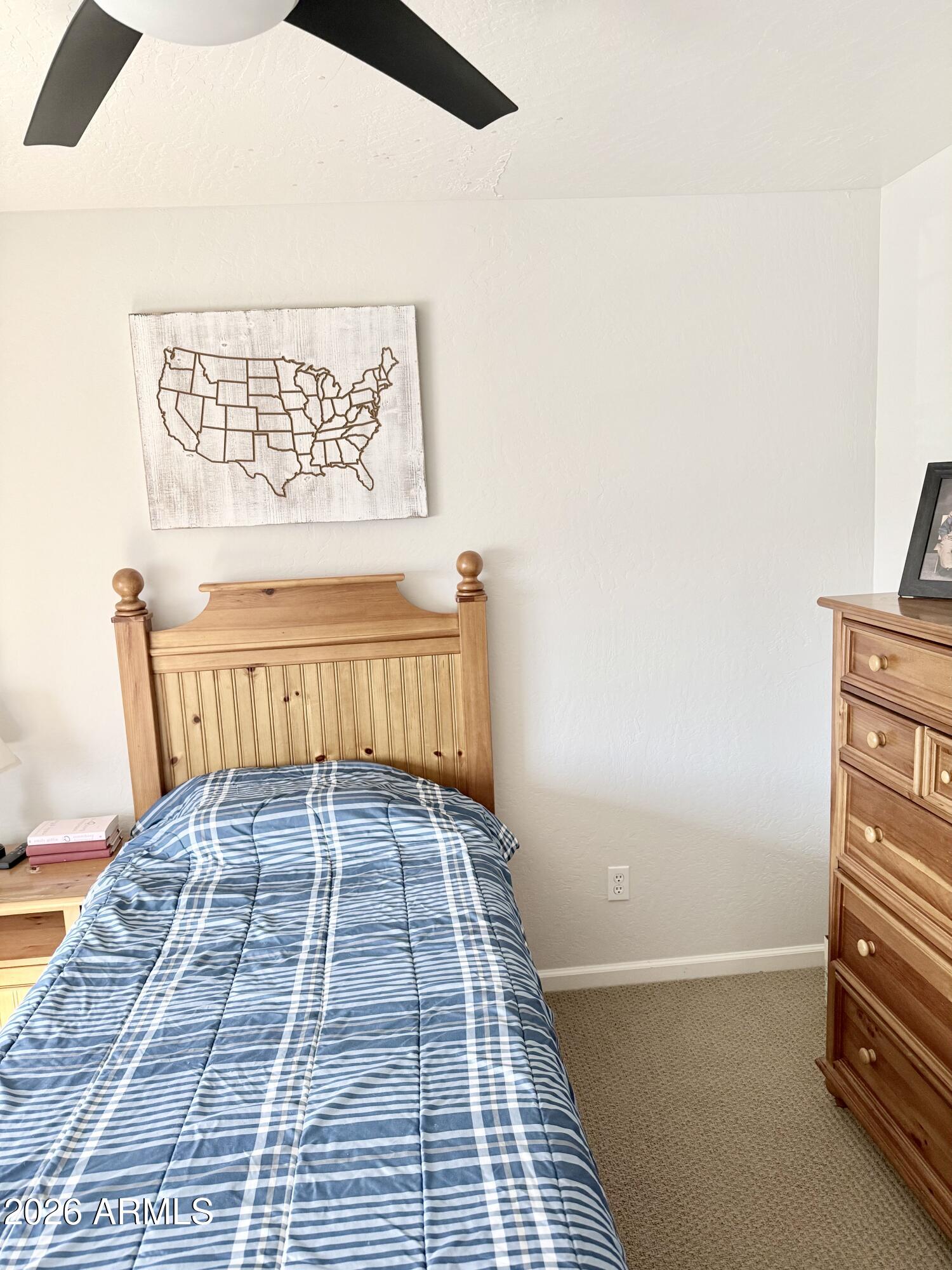 3426 East Clark Road Phoenix, AZ 85050 - Photo 31 of 48 a view of a bedroom with wooden floor