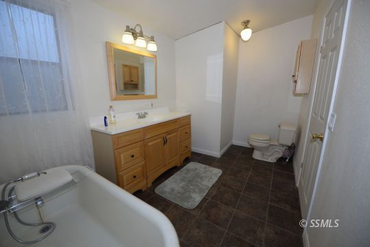 208 Charity Road Caliente, CA 93518 - Photo 14 of 47 a bathroom with a sink and a mirror