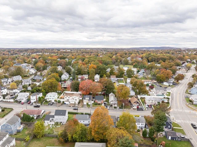an aerial view of residential building and lake view