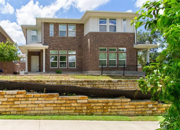a view of house with a swimming pool