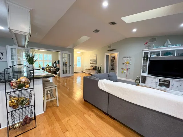 a room with furniture and a flat screen tv
