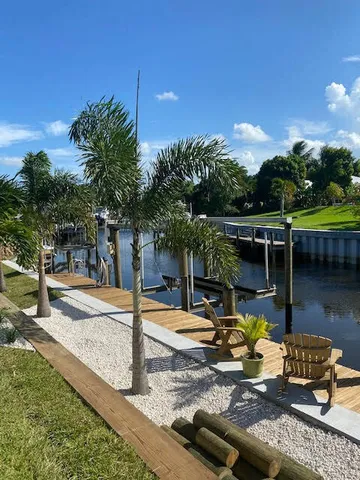 a view of a swimming pool with a patio