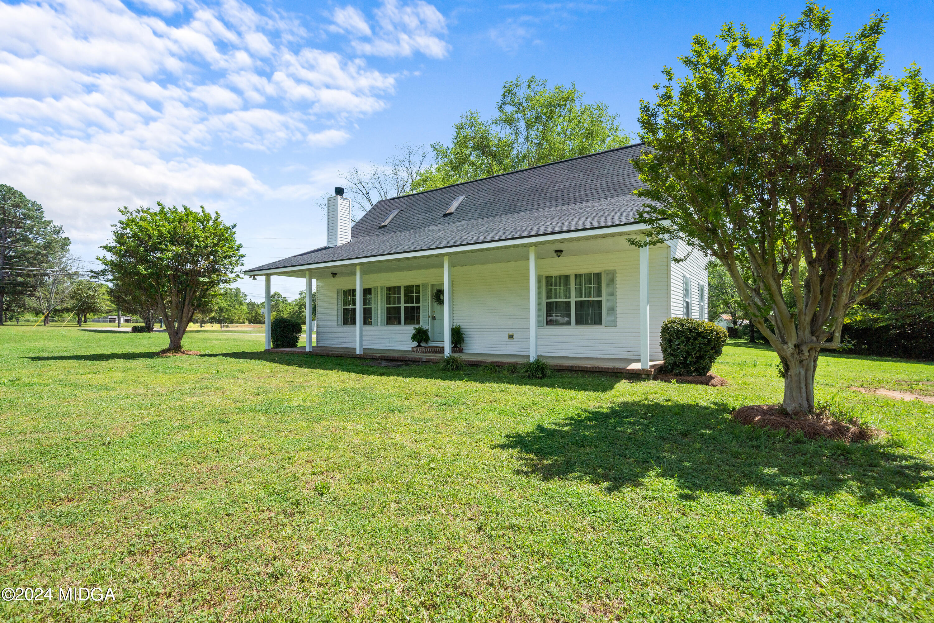246 Langston Road Perry, GA 31069 - Photo 37 of 37 a view of a house with a backyard
