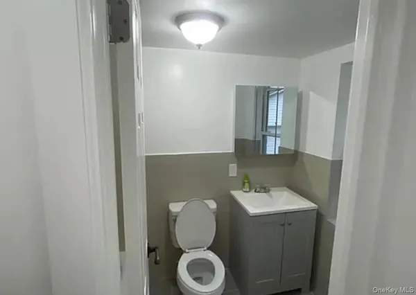 a bathroom with sink and mirror