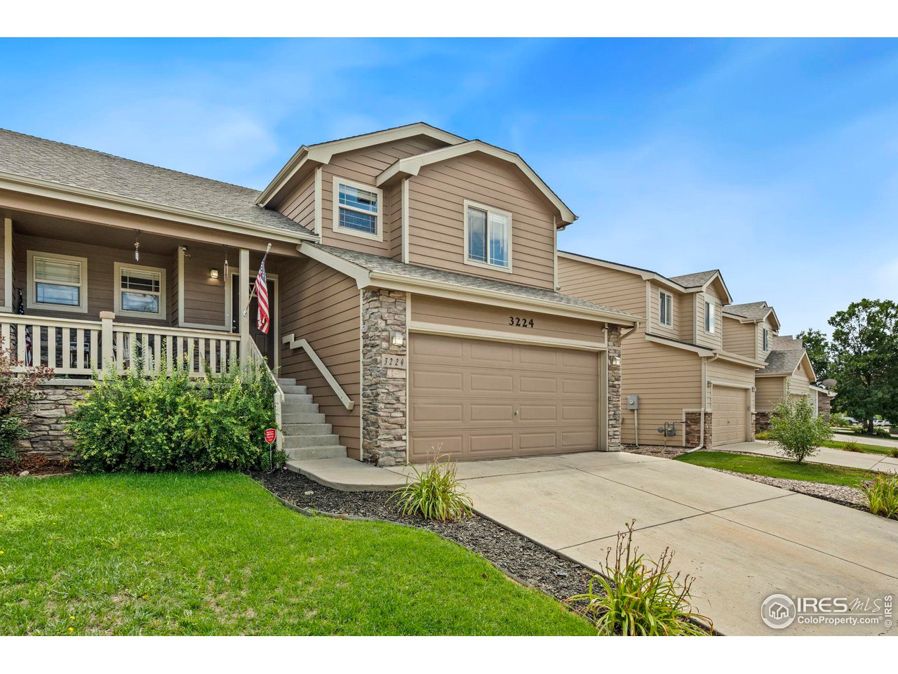 3224 Barbera Street Evans, CO 80634 - Photo 2 of 20 a front view of a house with a yard