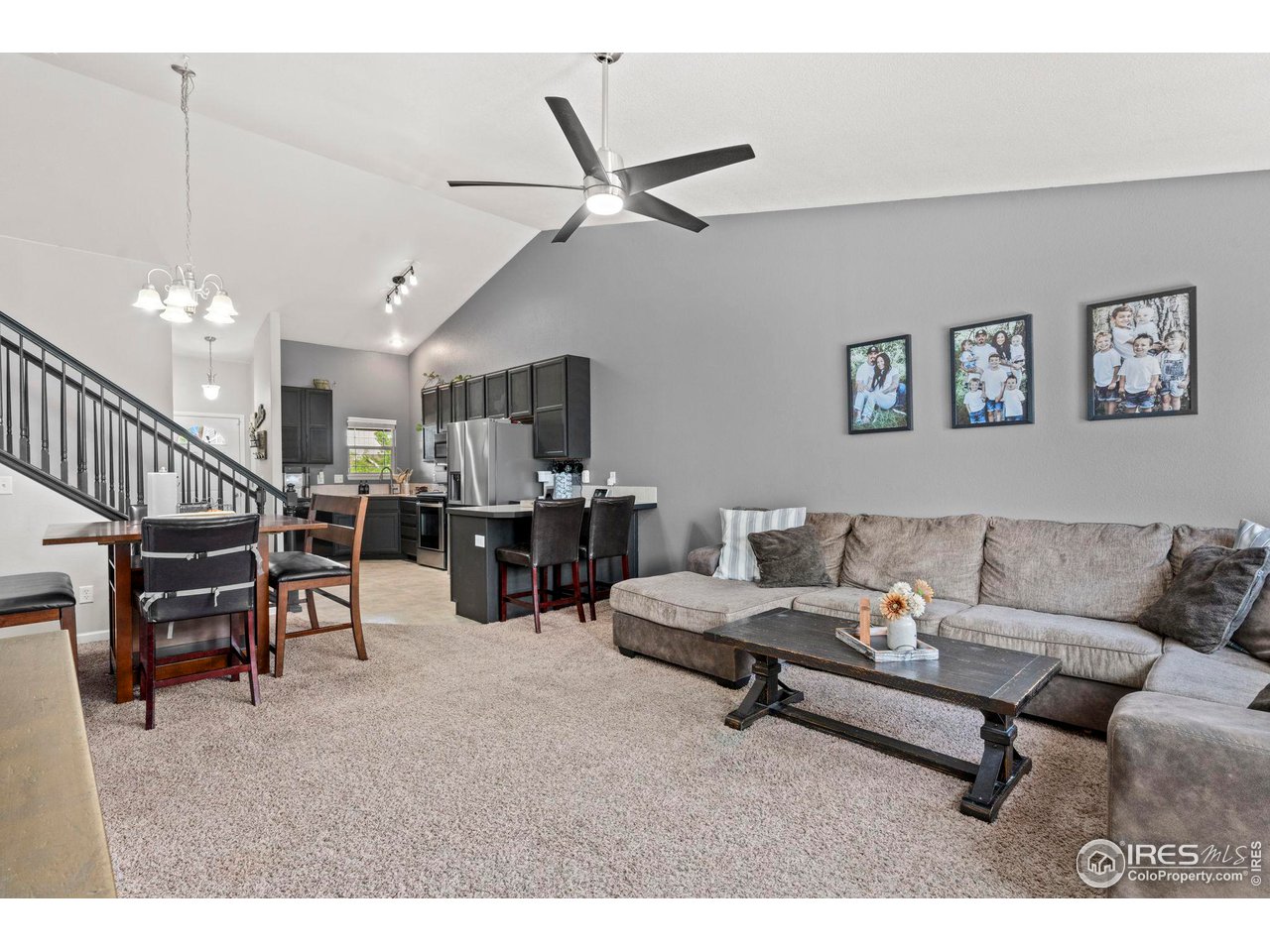 3224 Barbera Street Evans, CO 80634 - Photo 6 of 20 a living room with furniture and kitchen view