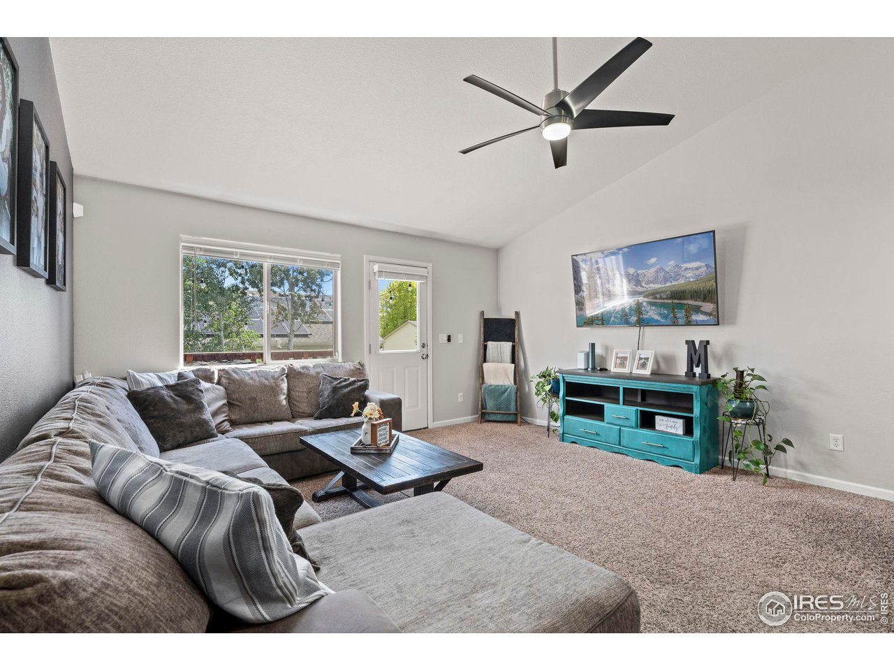 3224 Barbera Street Evans, CO 80634 - Photo 7 of 20 a living room with furniture and a window