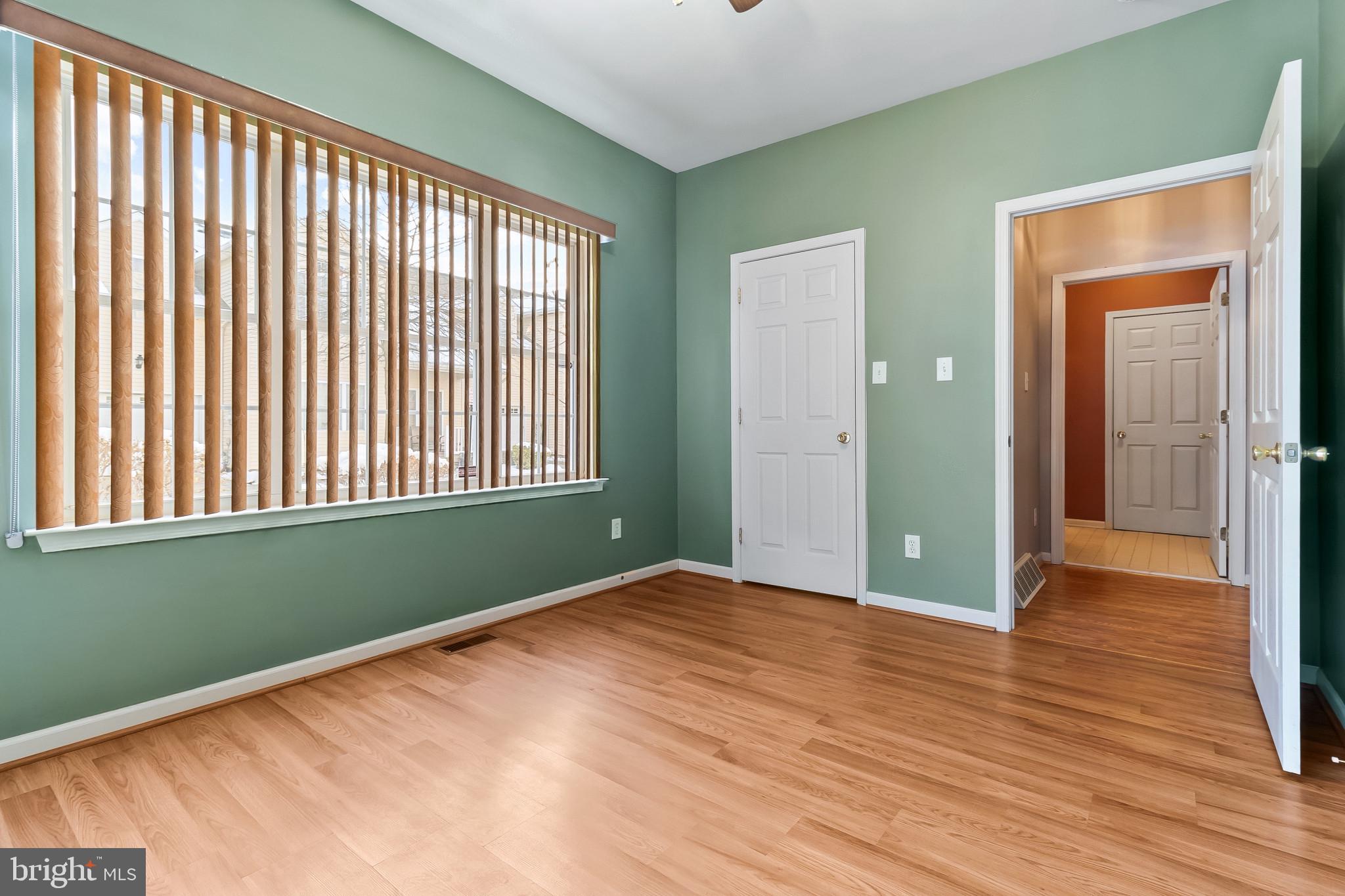 1 Osmond Way Delanco, NJ 08075 - Photo 13 of 26 a view of an empty room with wooden floor and a window