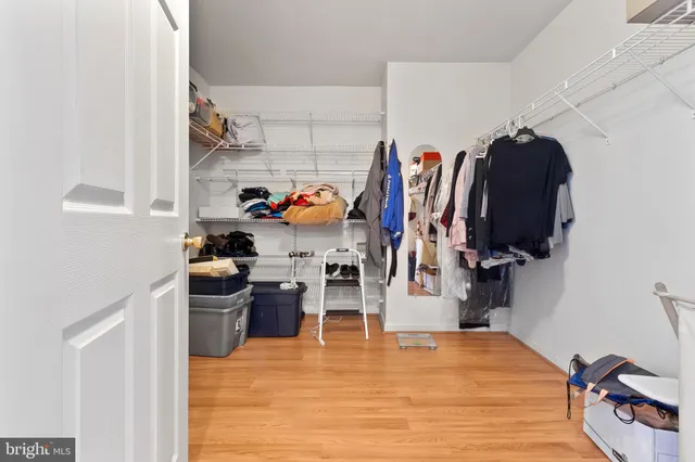 a view of a kitchen with a sink and cabinets