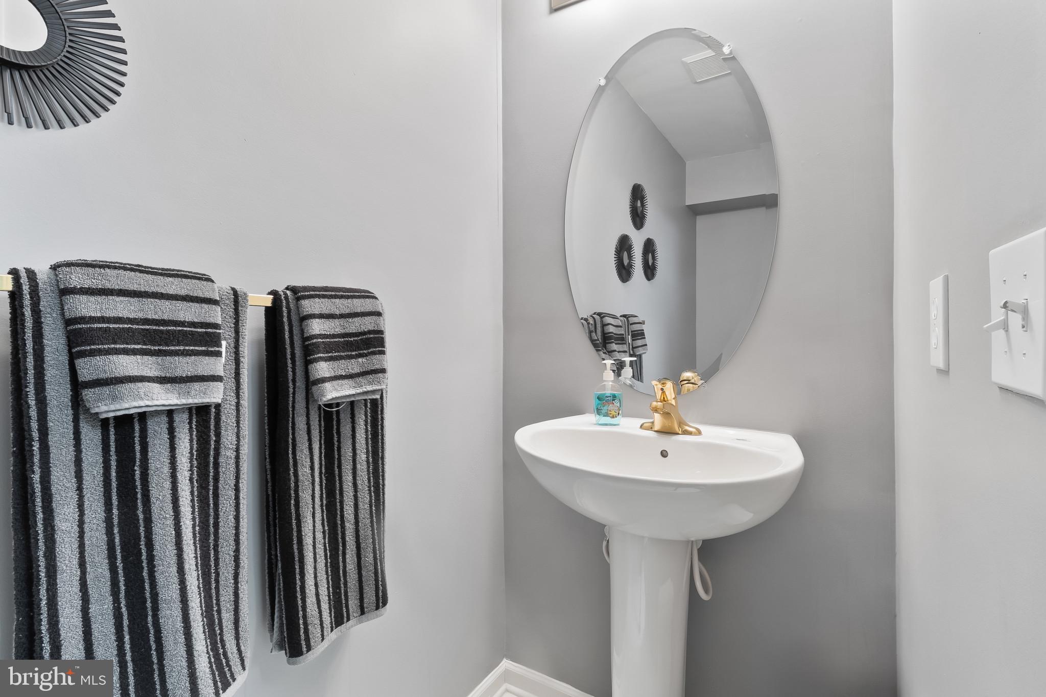 1 Osmond Way Delanco, NJ 08075 - Photo 26 of 26 a bathroom with a sink a mirror and bathtub