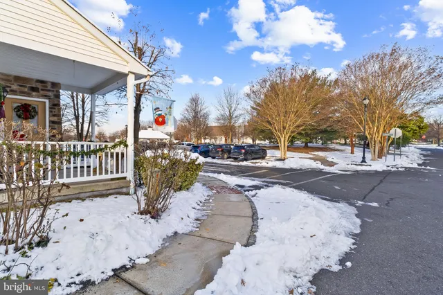 a view of street with residential house