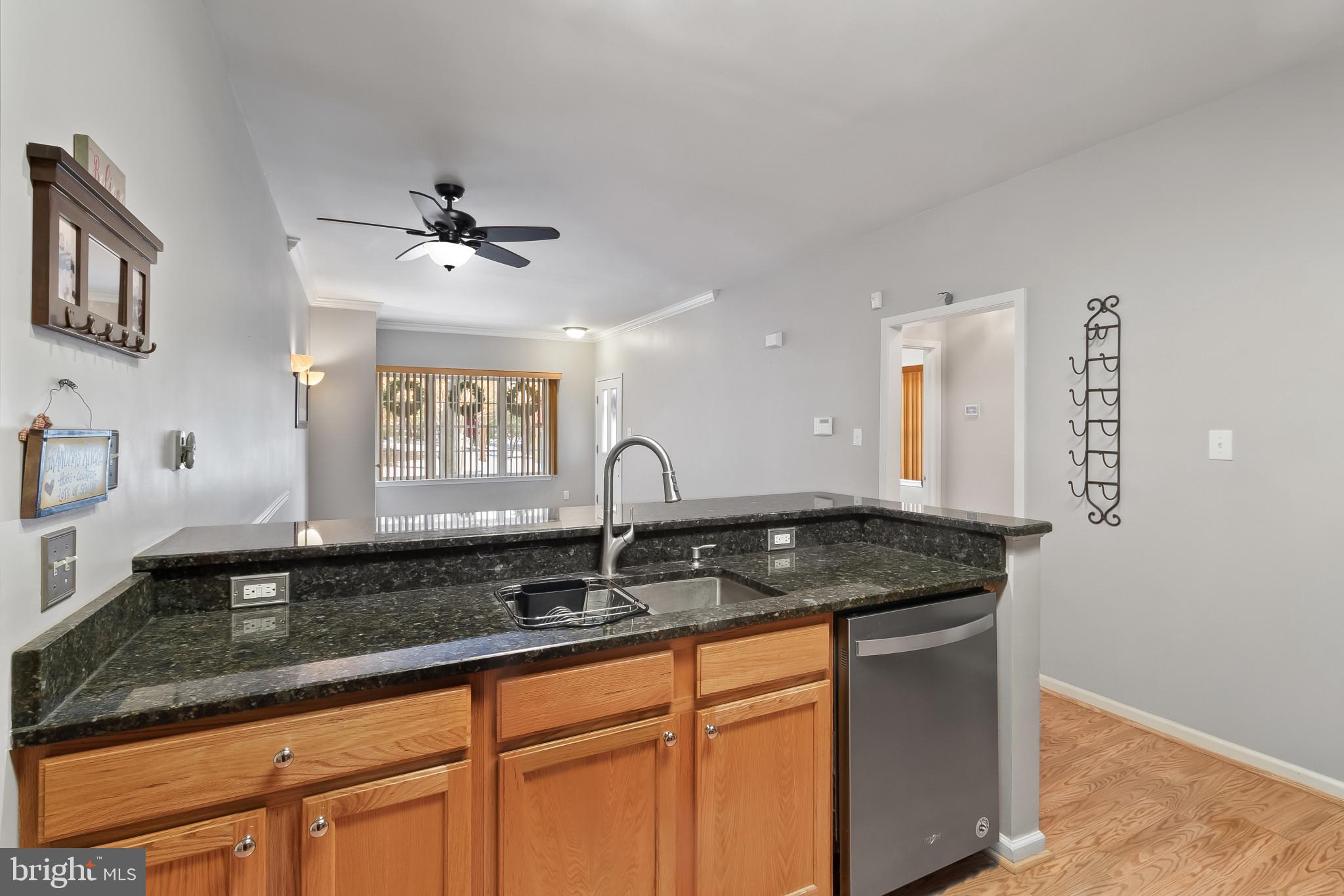 1 Osmond Way Delanco, NJ 08075 - Photo 6 of 26 a kitchen with granite countertop a sink a counter top space and cabinets