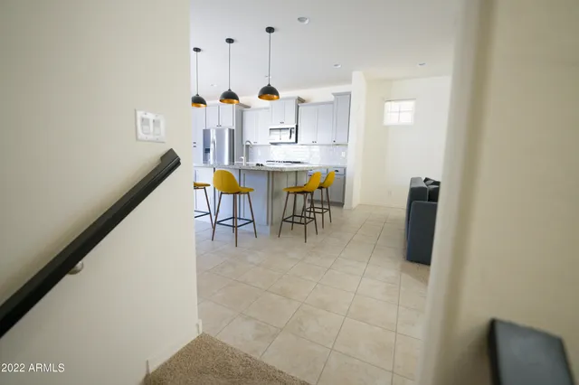 a dining room with furniture and a dining table
