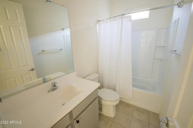 a view of an empty room and a gallery