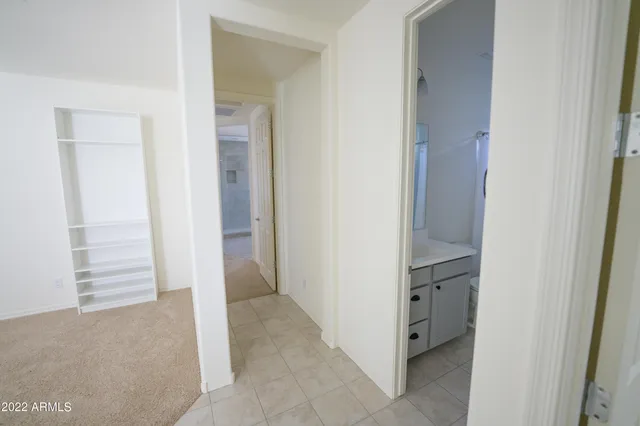 a room with a table and a window